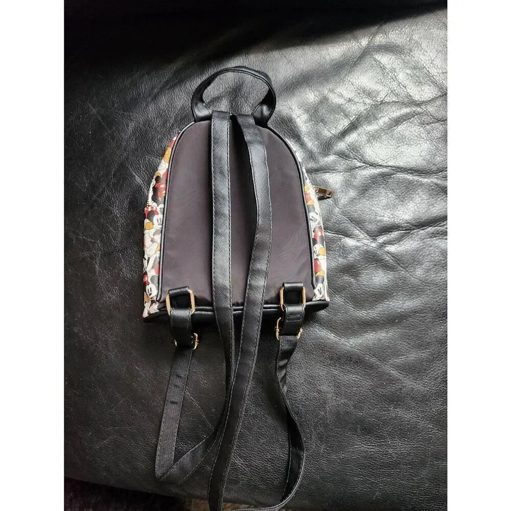 Disney Mickey Mouse backpack and matching card holder. Exterior zippered pocket